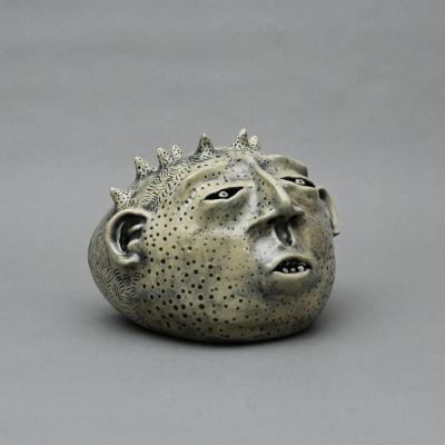 19. Creature Xix 9x7x9in White Stoneware 